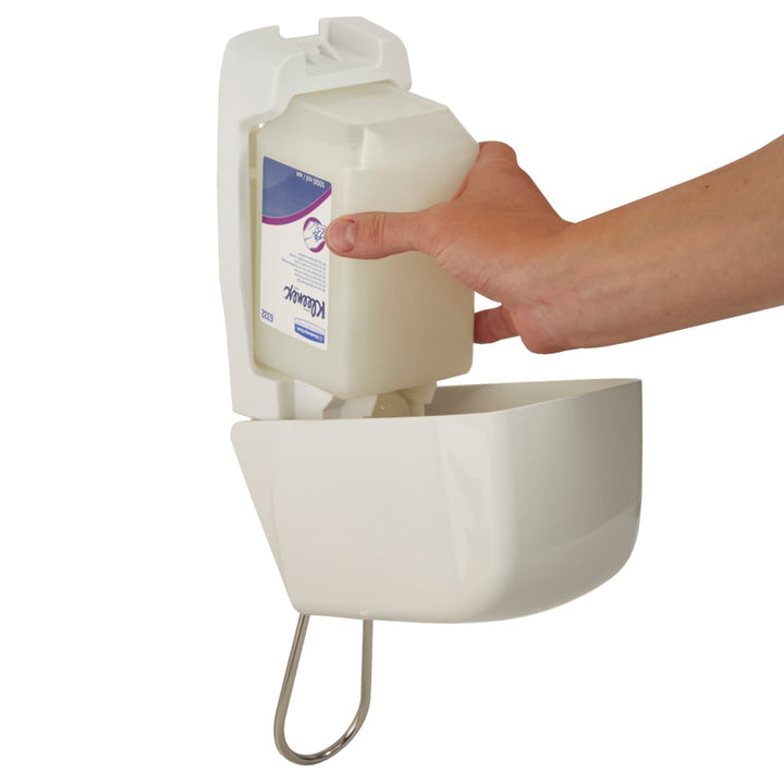 A Person Inserting a Hand Sanitiser Bottle into an Open White 6955 Kimberly Clark Hand Sanitiser Dispenser