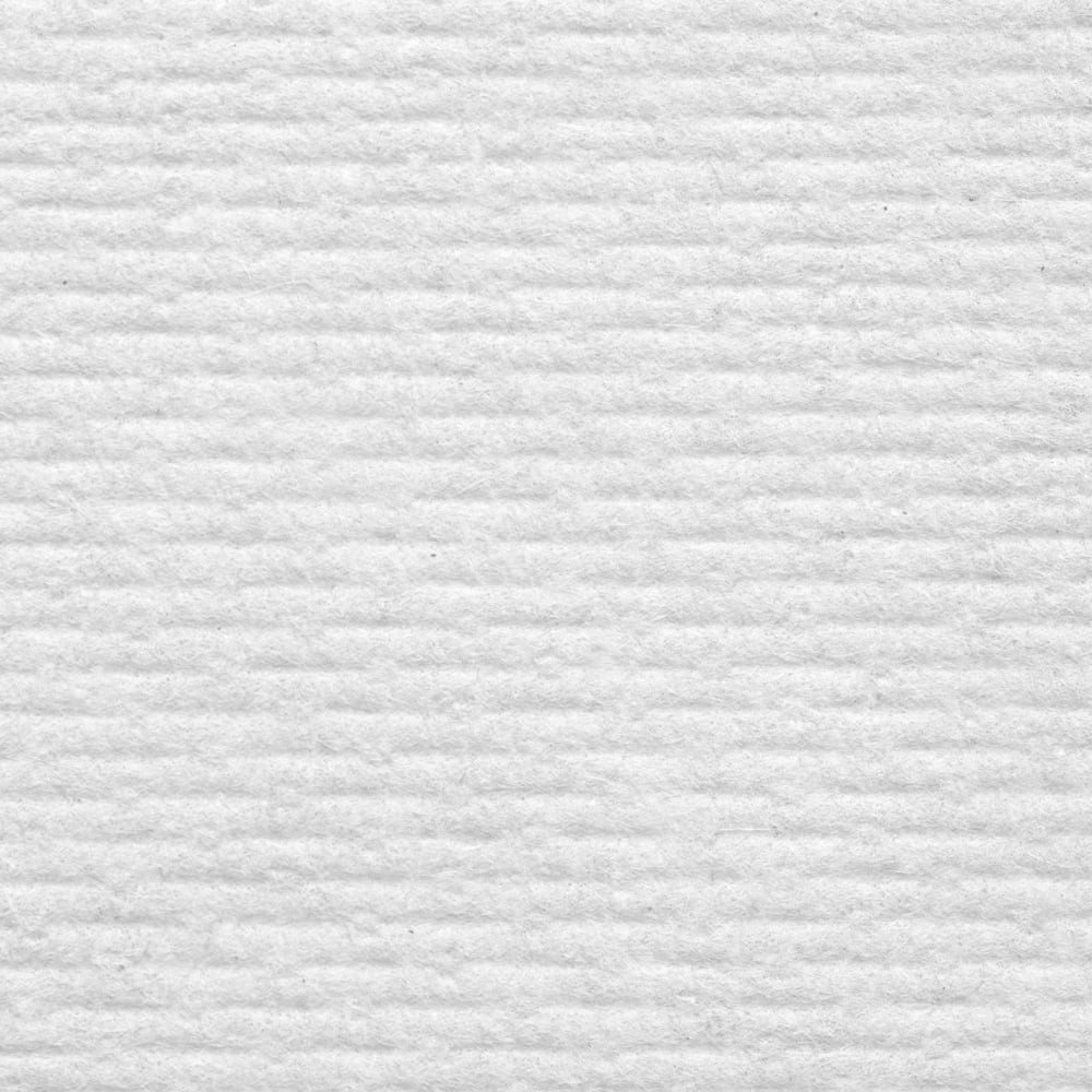 A Close Up View of a Single 7404 WypAll White Paper Hand Towel