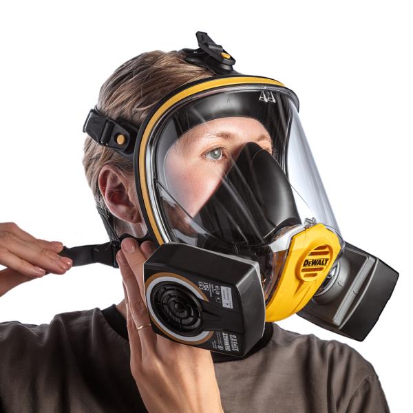 A Man Donning a Black, Yellow and Clear Visor DXIR1FFM DeWalt Full Face Mask with A2P3 Filters